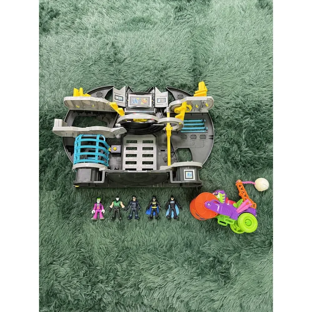 Fisher-Price Imaginext DC Super Friends Batcave Playset with 5 Figures & Vehicle